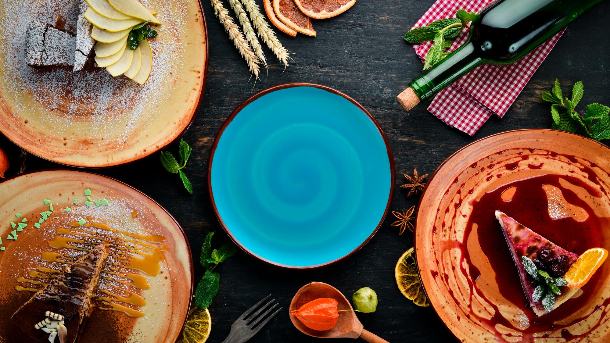 Collection of plated dishes representing pricing tiers
